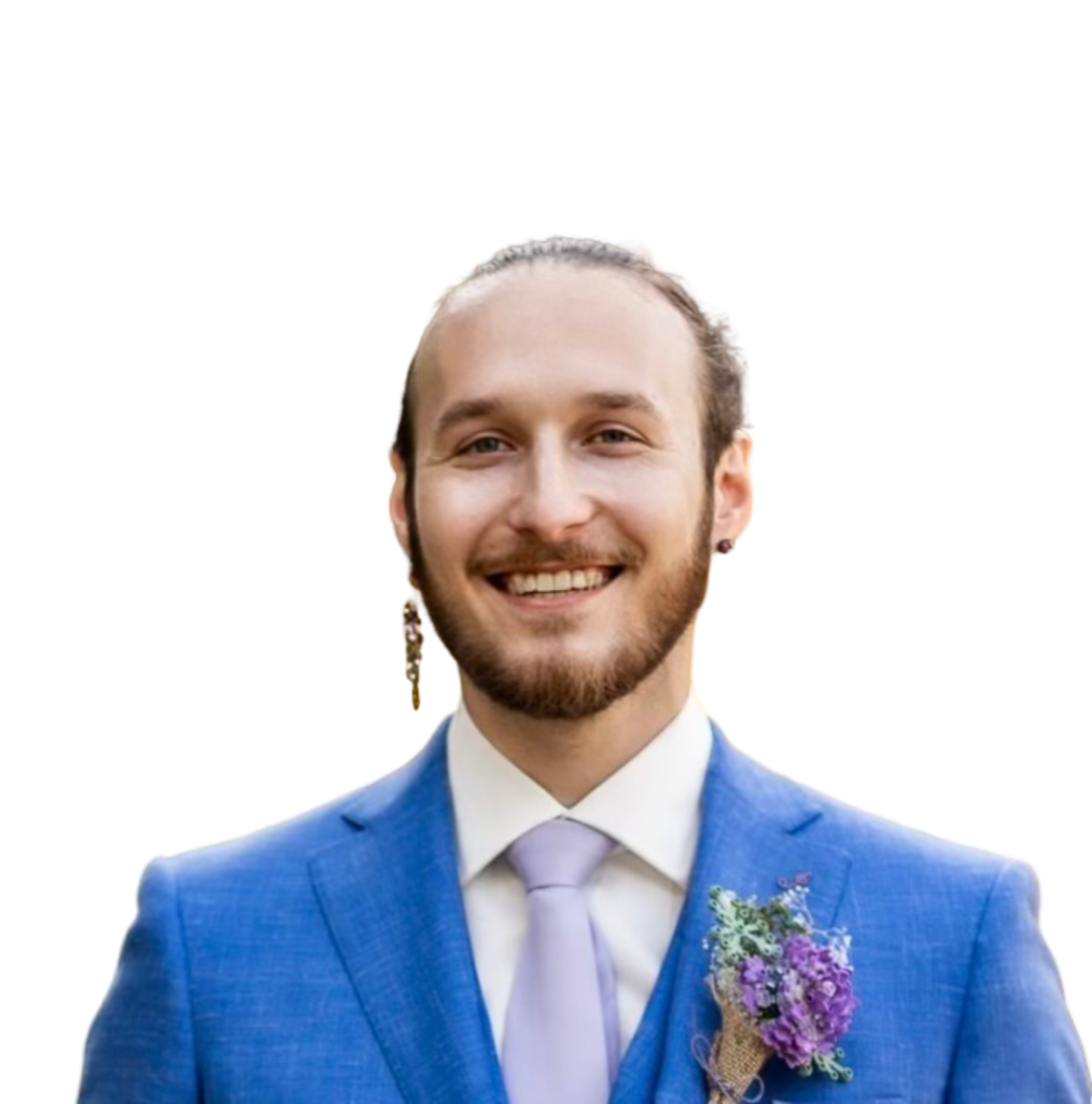 A picture of a handsome man in his late 20s, who happens to be Teddy Sullivan, the lead therapist of Karos Counseling.